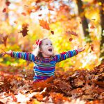 Sweet little girl in autumn park