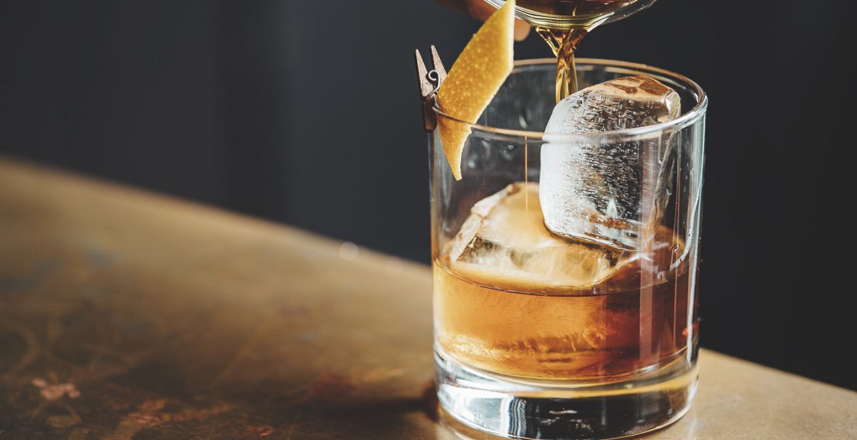 Pappy Van Winkle liquor barn: glass of bourbon with an orange twist