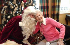 santa claus with elderly woman