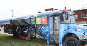 parents: a decorated blue bus