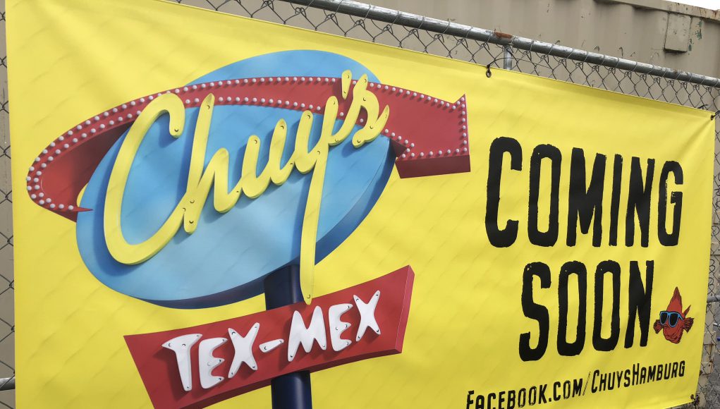 business: chuy's tex-mex sign that says coming soon