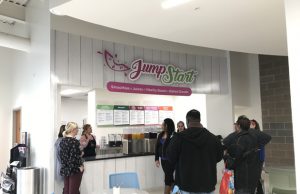juice bar that says jump start with white walls