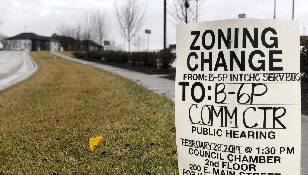 neighborhood: sign that said zoning change