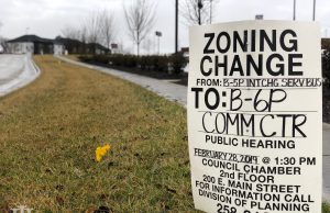 neighborhood: sign that said zoning change