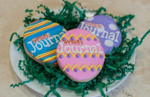 Easter Egg Hunt: cookies in the shape of eggs with colorful icing that says Hamburg Journal