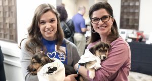 Lexington Humane Society Pet News: two women holding puppies
