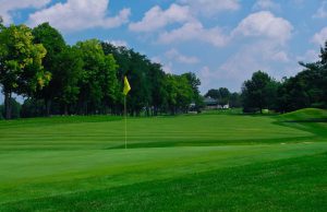 Greenbrier: golf course with a yellow flag in the hole