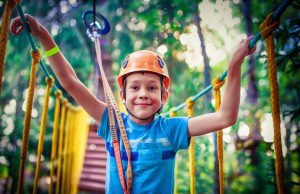 happy boy on the zipline