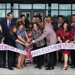 Brenda Cowan: group of people cutting a ribbon