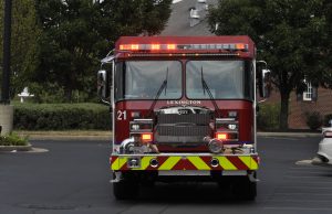 Neighborhood: a firetruck in a parking lot