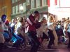 Halloween: a man dressed as michael jackson's thriller dancing in the street